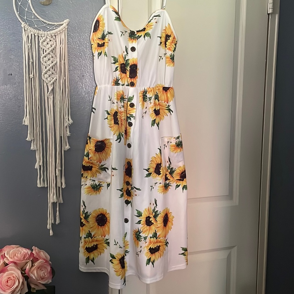 Woman’s sunflower dress